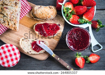 overhead view on healthy breakfast with strawberry jam
