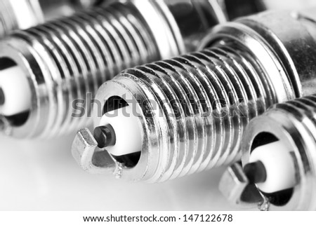 Set of spark plugs for the car on a white background