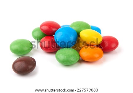 colorful chocolate buttons on a white background  Imagine de stoc © 