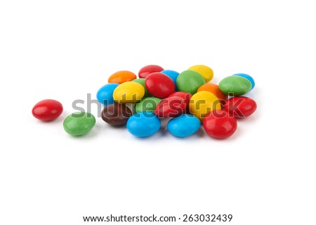 colorful chocolate buttons on a white background Imagine de stoc © 