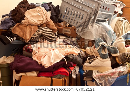 Pile of misc items stored in an unorganized fashion in a room Stock foto © 