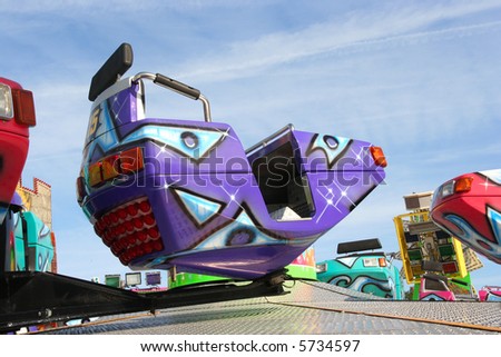 Car in a fun fair carousel