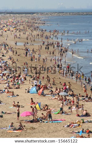 SCHEVENINGEN, HOLLAND - JULY 26: People crowd Holland's most popular beach on a hot summer saturday July 26, 2008