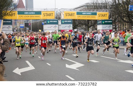 THE HAGUE, HOLLAND - MARCH 13: Runners at the start of the half marathon of The Hague, Holland on March 13, 2011