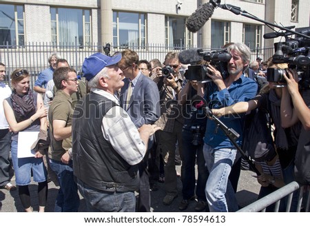 THE HAGUE, HOLLAND - MAY 27: International TV crews and Srebrenica eyewitness at the Yugoslavia Tribunal in The Hague, Holland, on May 27, 2011 where Serbian ex-general Mladic is tried for war crimes