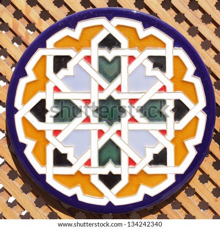 Typical ceramic andalusian plate with arabic pattern