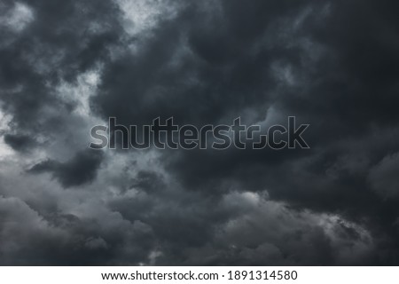 Black havy stormy clouds, may be used as background