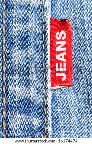 Blue jeans and red label with word 
