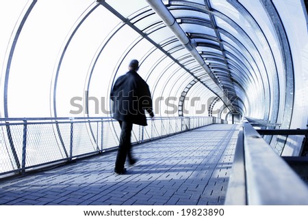 Perspective of the passage and man in motion blur