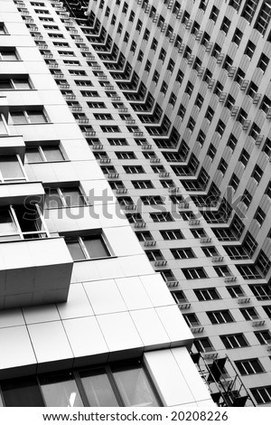 New vacant modern apartment building. Black and white image.