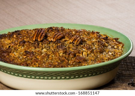 Home made baked sweet potato casserole with pecan topping