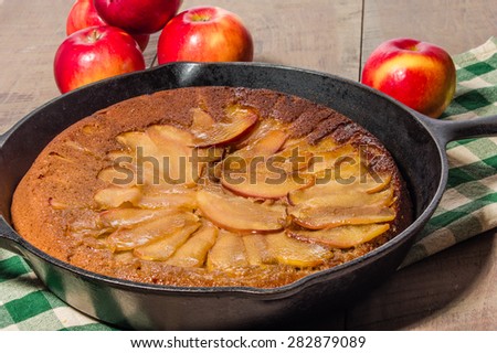 Cast iron skillet apple cake with apples and apple slices