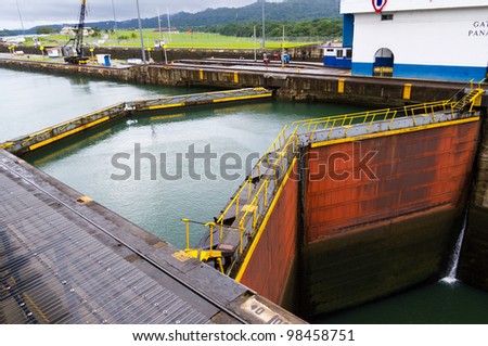 The gates at the Gatun Locks on the Panama Canal with the pool in the background