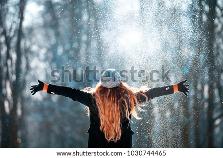 Similar – Image, Stock Photo Woman throwing snow in snowy landscape in winter.