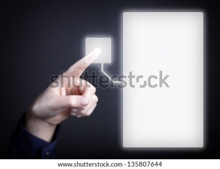 Woman's hand pushing the button on touch screen. Choice concept