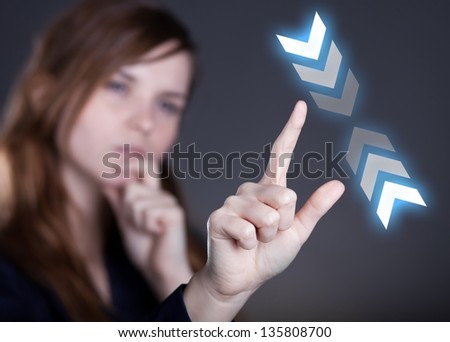 Woman\'s hand and zoom out gesture on touch screen