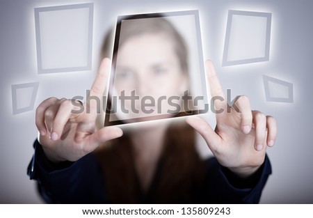 Woman's two hands pointing button on touch screen