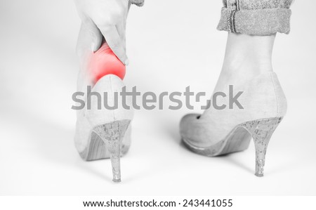 Woman\'s legs ankle pain in high heels