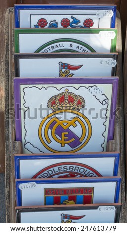 PORT DE SOLLER, MAJORCA, SPAIN - OCTOBER 25, 2013: Ceramic tiles with various football team logos such as Real Madrid on October 25, 2013 in Soller, Majorca, Spain.
