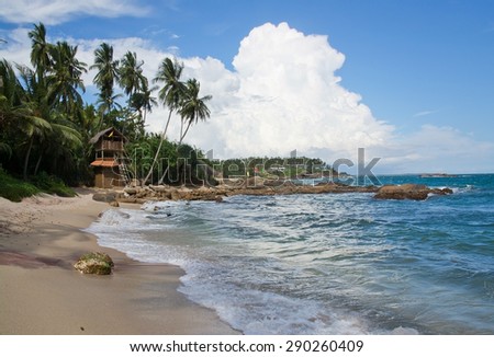 TANGALLE, SRI LANKA - DECEMBER 12, 2015: Sea food restaurant Think Club built by wooden sticks and buffalo dung on the Rocky Point beach on December 12, 2015 in Tangalle, Sri Lanka.