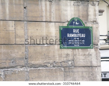 PARIS, FRANCE - JANUARY 2, 2010: Rue Rambuteau street sign on building stone wall on January 2, 2010 in Paris, France.