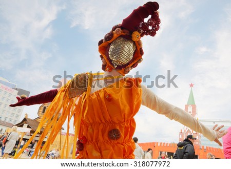 PERM, RUSSIA - JUN 15, 2014: Woman in costume dances on street theaters show at open air White Nights