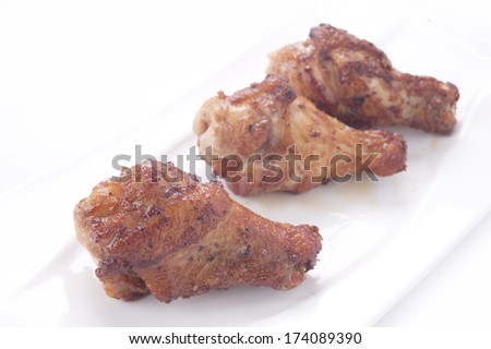 Spicy grilled chicken on plate