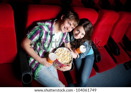 couple in a movie theater, watching movie