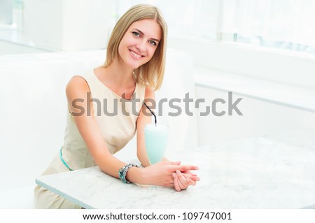 portrait of a beautiful woman in the cafe. resting and relaxing, urban lifestyle