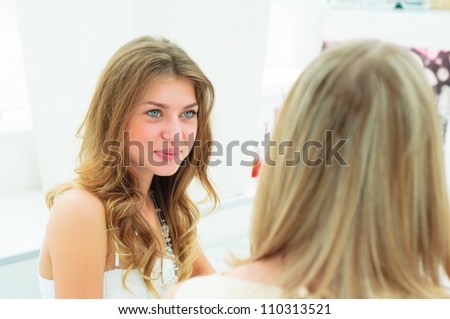 Two women talking in a cafe, enjoy spending time together