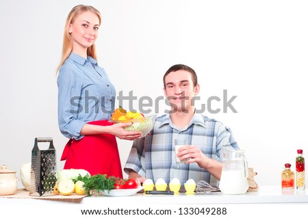 wife gives her husband a meal, have a nice time