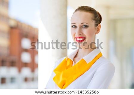 Portrait of successful business woman smiling and looking at the camera
