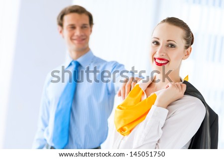 young successful business woman receiving congratulations from his colleagues