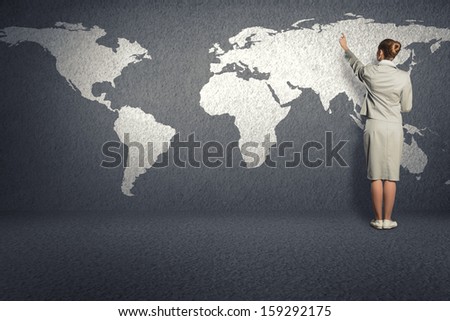 business woman draw a map on the wall, a global business