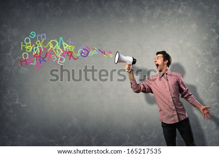 Portrait of a young man shouting using megaphone, of the horn fly, abstract symbols