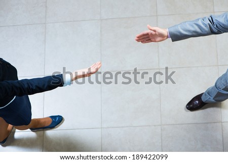 businessman pull his hands toward each other, the future handshake