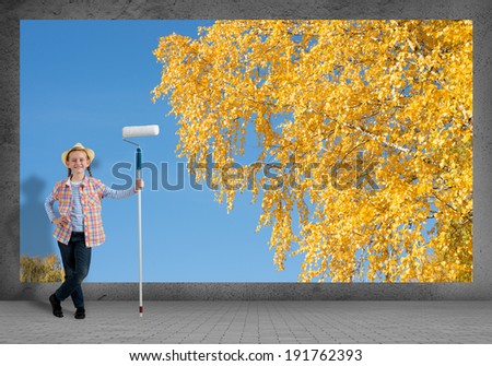 image of a girl with roller stands near the wall where the landscape