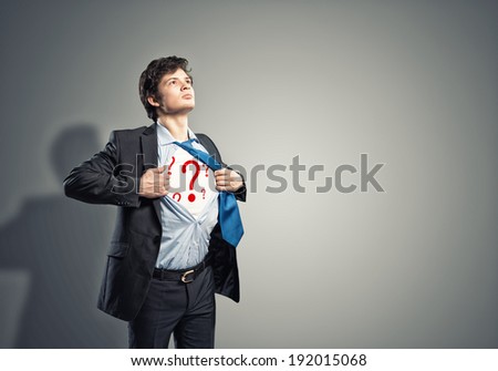 businessman breaks the shirt, under which the question marks