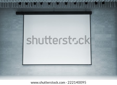 Image of cinema auditorium with blank screen