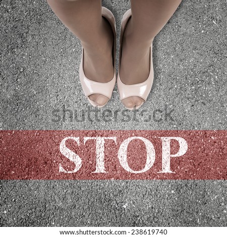 Close up of businesswoman feet standing in line