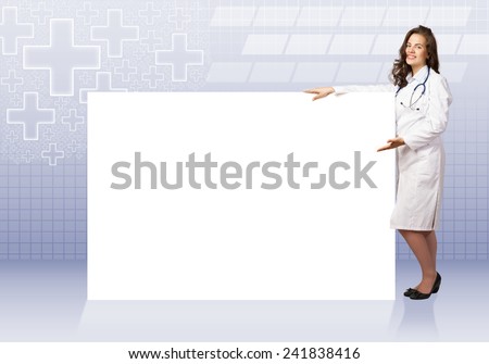 Young pretty woman doctor with white blank banner