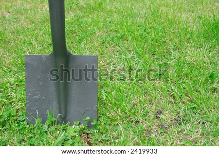 Spade in the ground