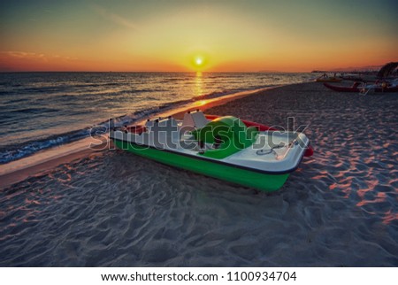 lido di camaiore's pier at sunset with a  multicolored sky Foto stock © 