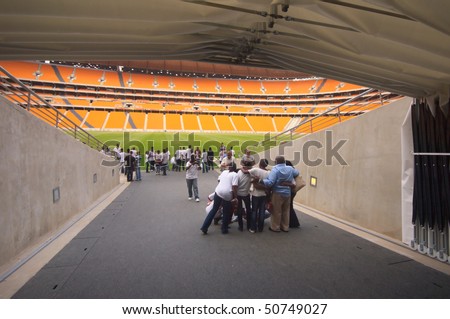 JOHANNESBURG - 28 MARCH: Scholars from the state of switzeland visits the soccer city stadium ion johanneburg just completed