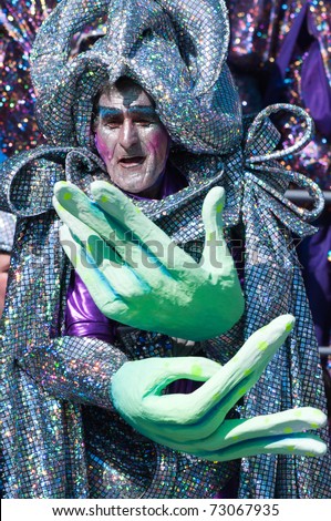 VIAREGGIO, ITALY - MARCH 6:  old man in carnival mask, during the famous Carnival of Viareggio on march 6, 2011 in Viareggio, Italy