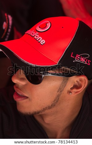 MONACO, FRANCE-MAY 28:formula one champion lewis hamilton driver signs autograph to fans at the end of the qualify for the grand prix of monaco on may 28, 2011 in Monaco, france
