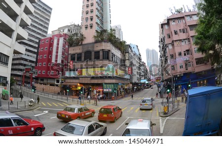HONG KONG - March 29: View of Shanghai Street on March 29, 2013 in Mongkok, Hong Kong. Shanghai Street is a 2.3 km long street in the Jordan, Yau Ma Tei and Mongkok areas of Kowloon, Hong Kong.