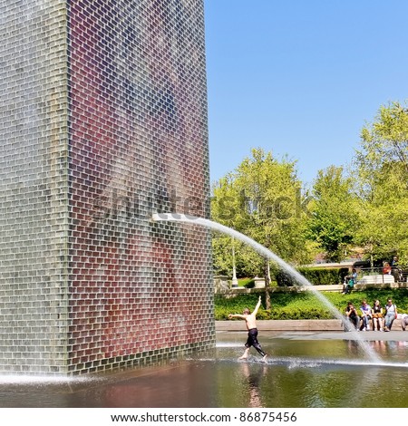 CHICAGO,IL - MAY 15: The Jaume Plensa\'s Crown fountain on May 15, 2009 in Millennium Park, Chicago, Illinois. An interactive work of public art and video sculpture featured. Designed by Jaume Plensa.