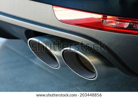 Close up of a  car dual exhaust pipe