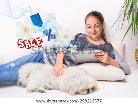 Woman is shopping online with tablet pc .